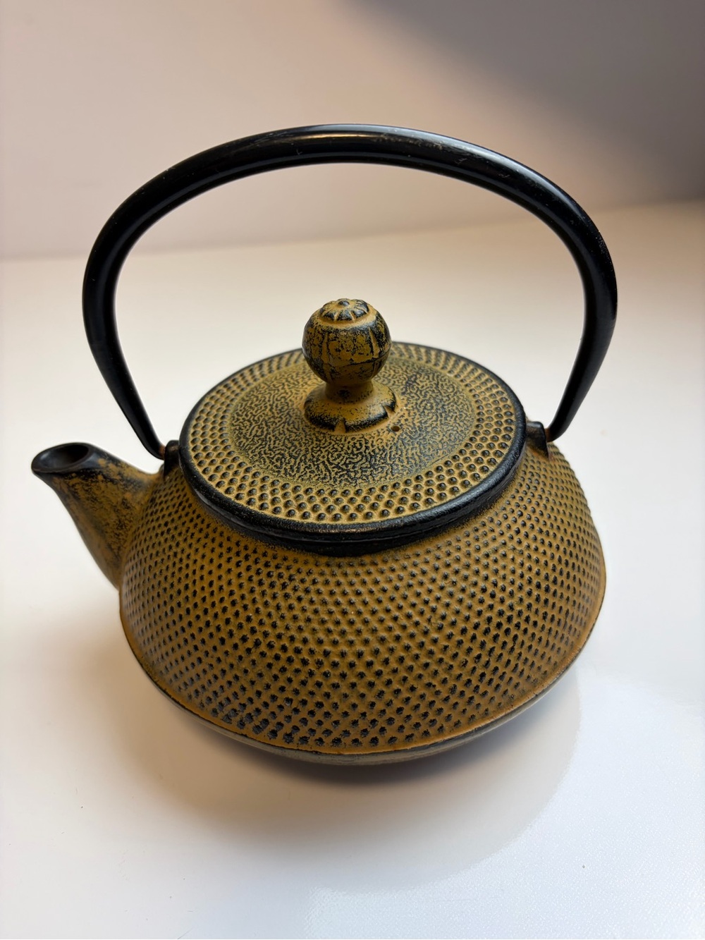 Tan Cast Iron Teapot with Black Handle